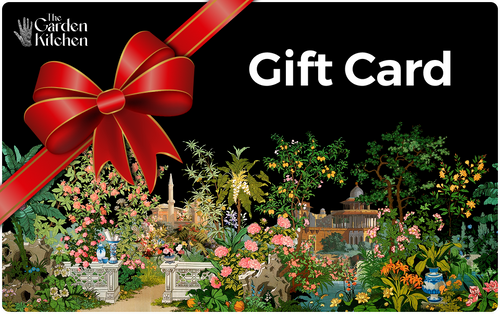 Gift card with a garden scene and red bow, featuring 'The Garden Kitchen' brand.