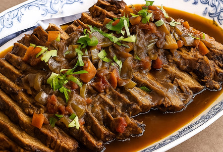 Stewed dish with vegetables on a decorative plate